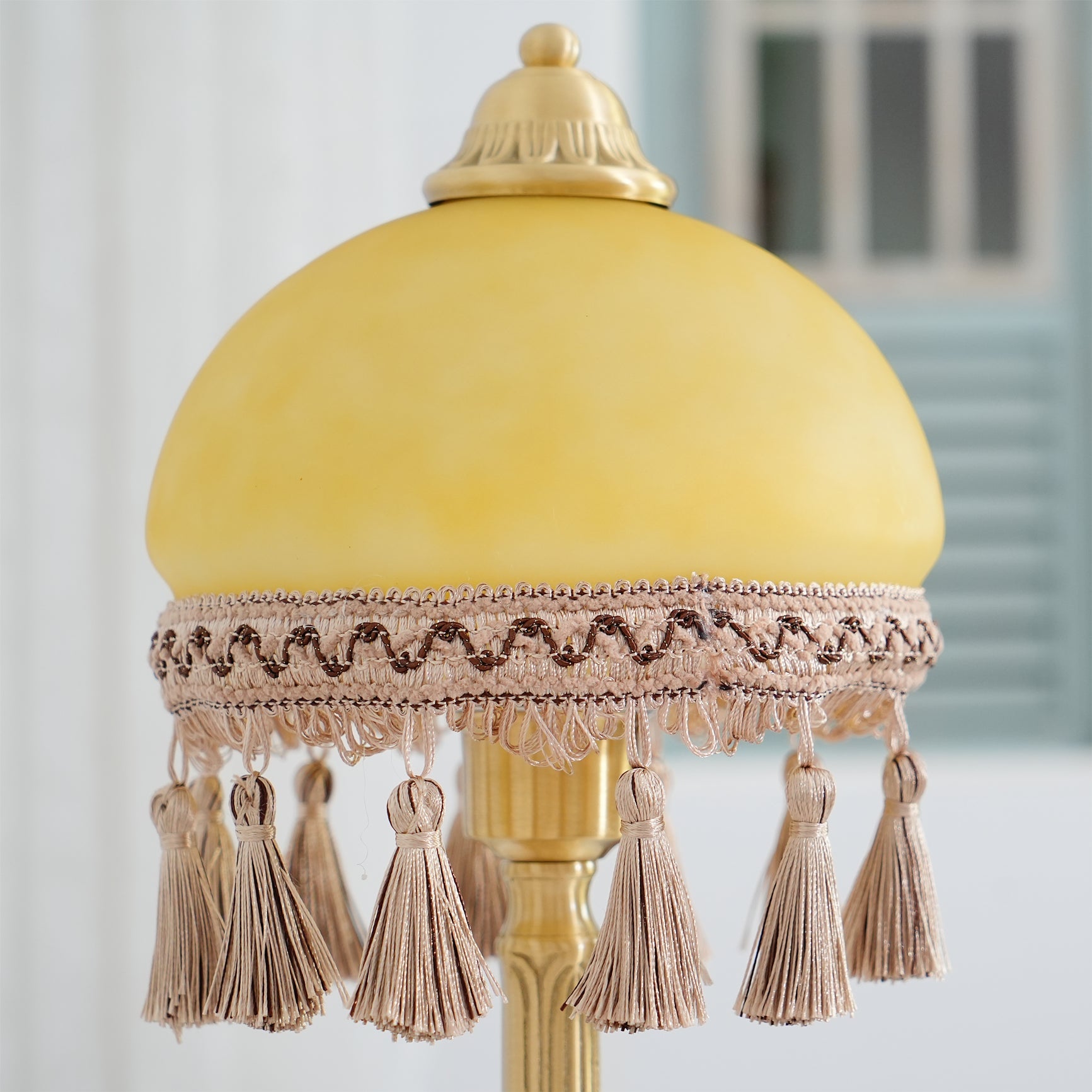 CHATEAU DORÉ BRASS TASSELED LAMP