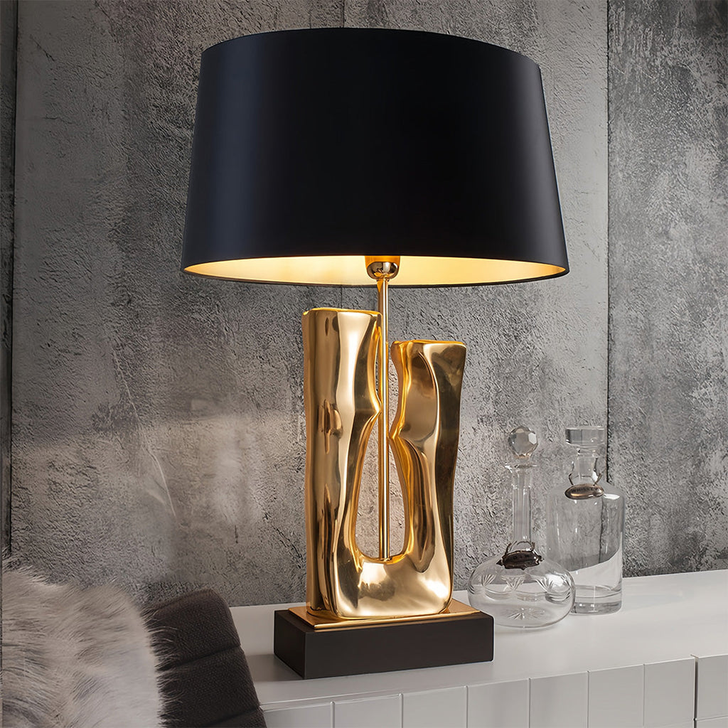 RAVENWOOD GOLDEN HORIZON TABLE LANTERN WITH SCULPTED BASE AND DRUM SHADE