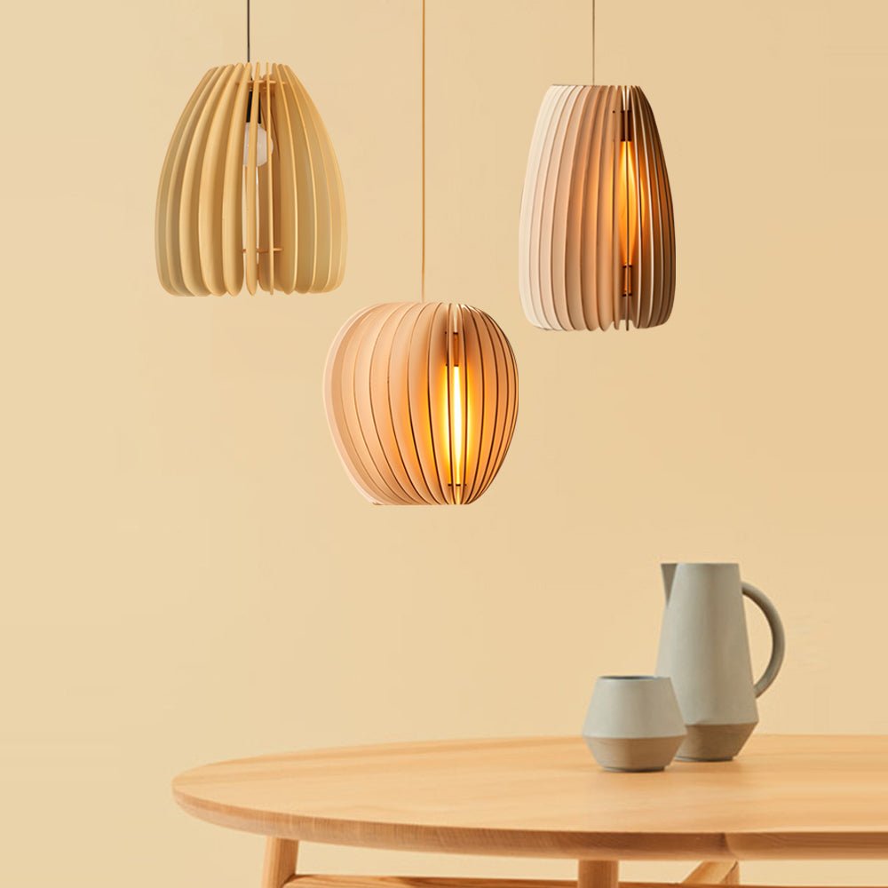 **FENWICK WOODEN RAY PENDANT LANTERN**  
A captivating blend of Scandinavian and Japanese design, this handcrafted wood veneer lantern features an LED light source, casting warm, inviting rays that enhance any space with a touch of nature-inspired charm.