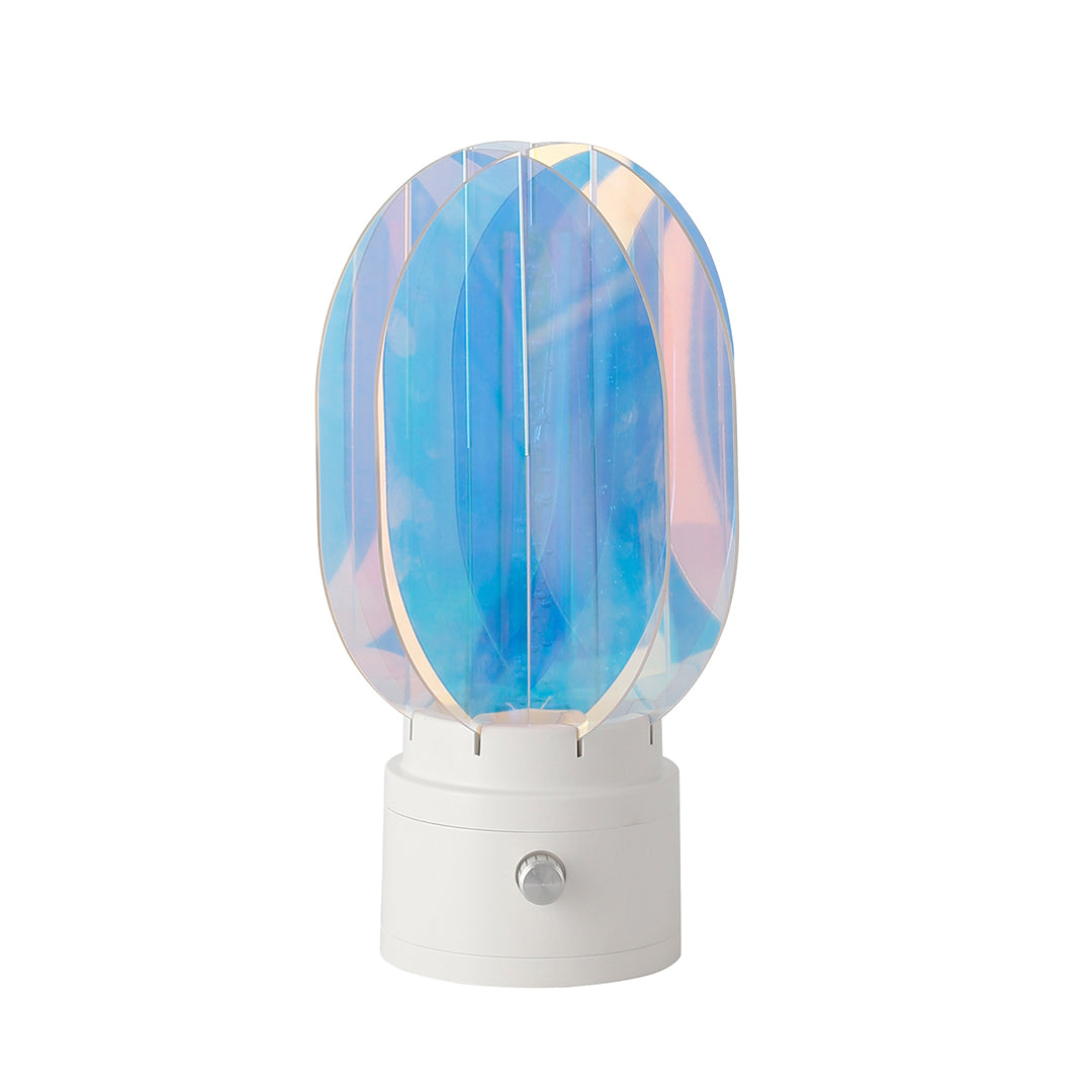 1. "VIVIENNE RAINBOW METAL TABLE LAMP"  
   A vibrant blend of colors and artistic design, this aluminum table lamp radiates warmth and creativity with its unique LED illumination.

2. "HAMPSTEAD ARTISANAL RAINBOW LAMP"  
   A striking fusion of color and