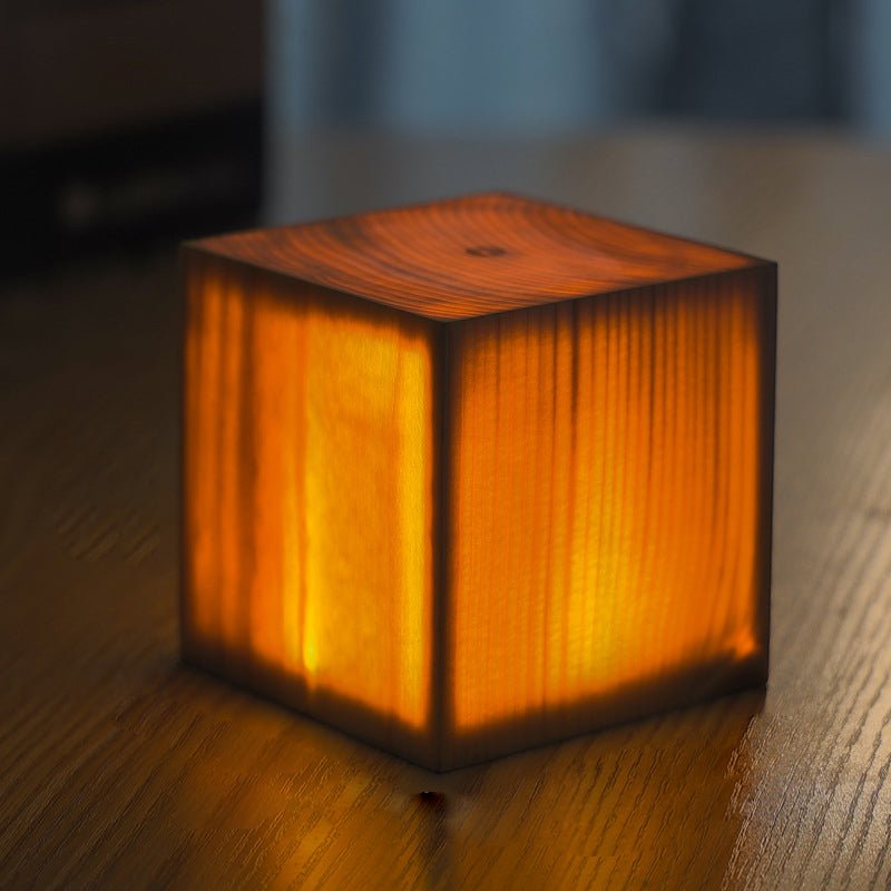 1. "WINSLOW ILLUMINATION CUBE TABLE LANTERN"  
   - A modern cube-shaped lamp that casts a warm glow, perfect for accentuating any space.

2. "DORCHESTER GLOWING SQUARE TABLE LIGHT"  
   - A sophisticated square lamp that combines contemporary design with