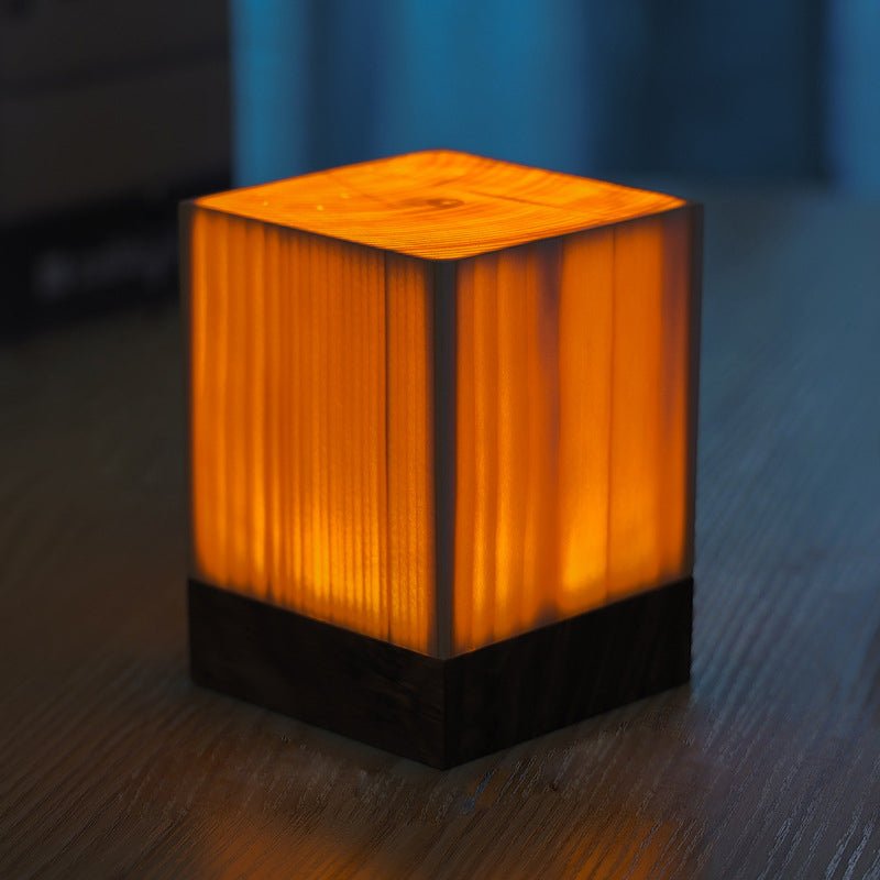 1. "WINSLOW ILLUMINATION CUBE TABLE LANTERN"  
   - A modern cube-shaped lamp that casts a warm glow, perfect for accentuating any space.

2. "DORCHESTER GLOWING SQUARE TABLE LIGHT"  
   - A sophisticated square lamp that combines contemporary design with