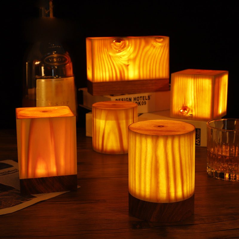 1. "WINSLOW ILLUMINATION CUBE TABLE LANTERN"  
   - A modern cube-shaped lamp that casts a warm glow, perfect for accentuating any space.

2. "DORCHESTER GLOWING SQUARE TABLE LIGHT"  
   - A sophisticated square lamp that combines contemporary design with