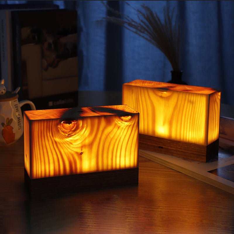 1. "WINSLOW ILLUMINATION CUBE TABLE LANTERN"  
   - A modern cube-shaped lamp that casts a warm glow, perfect for accentuating any space.

2. "DORCHESTER GLOWING SQUARE TABLE LIGHT"  
   - A sophisticated square lamp that combines contemporary design with