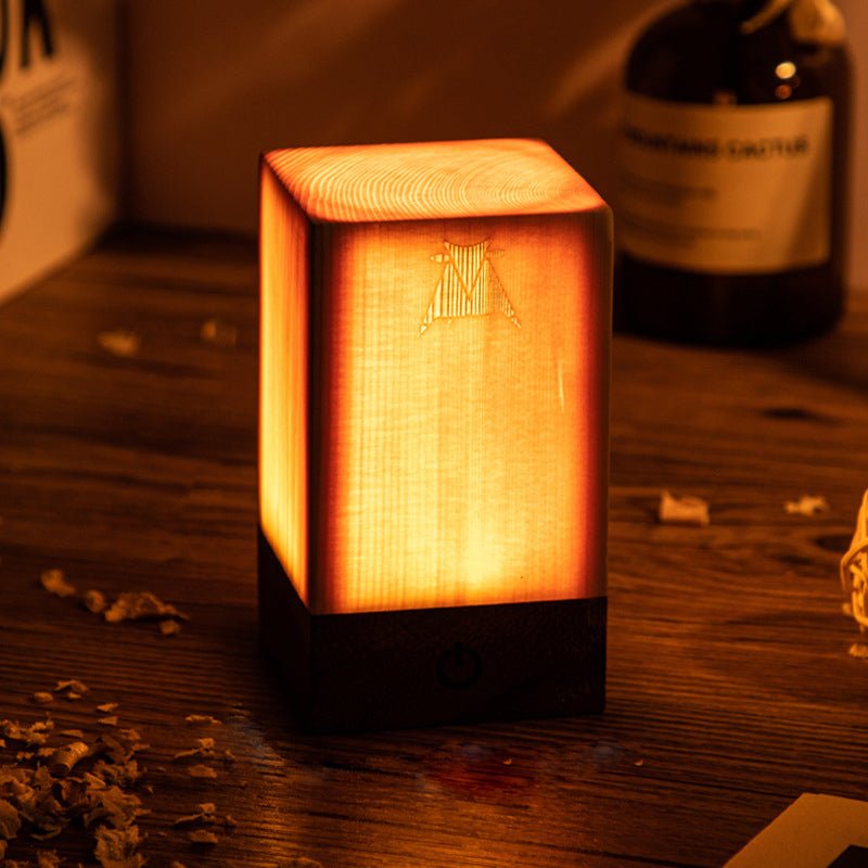 1. "WINSLOW ILLUMINATION CUBE TABLE LANTERN"  
   - A modern cube-shaped lamp that casts a warm glow, perfect for accentuating any space.

2. "DORCHESTER GLOWING SQUARE TABLE LIGHT"  
   - A sophisticated square lamp that combines contemporary design with