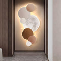 ASTRAL ORB ILLUMINATED WALL LIGHT