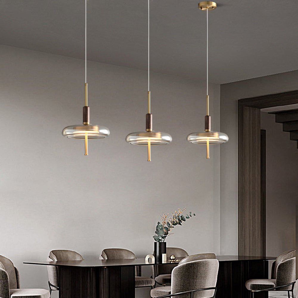 HASTINGS TRIO DIMMER PENDANT LIGHT WITH WOODEN ACCENTS"  
2. "WINTERBOURNE GLASS AND BRASS NORDIC HANGING LANTERN"  
3. "BROMLEY ILLUMINATED WOODEN TRIM PENDANT LIGHT"  
4. "LAVENDER HILL BRASS AND GLASS DIMMABLE HANGING LIGHT"  
5. "CARTERFORD MINIMALIST