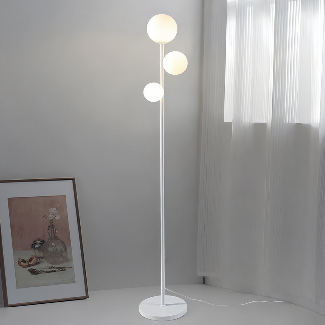 WINTHROP TRIO SPHERE FLOOR LIGHTING IN GILDED BLACK AND WHITE