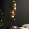 WINTHROPE BRASS OVAL WALL SCONCE WITH CRYSTAL CLEAR GLAZE