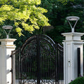 WINTHORPE SOLAR-POWERED ROUNDED POST LANTERN WITH DUAL MOTION DETECTION