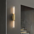 WINTHROP BRASS CYLINDRICAL WALL SCONCE WITH GLASS ELEMENTS