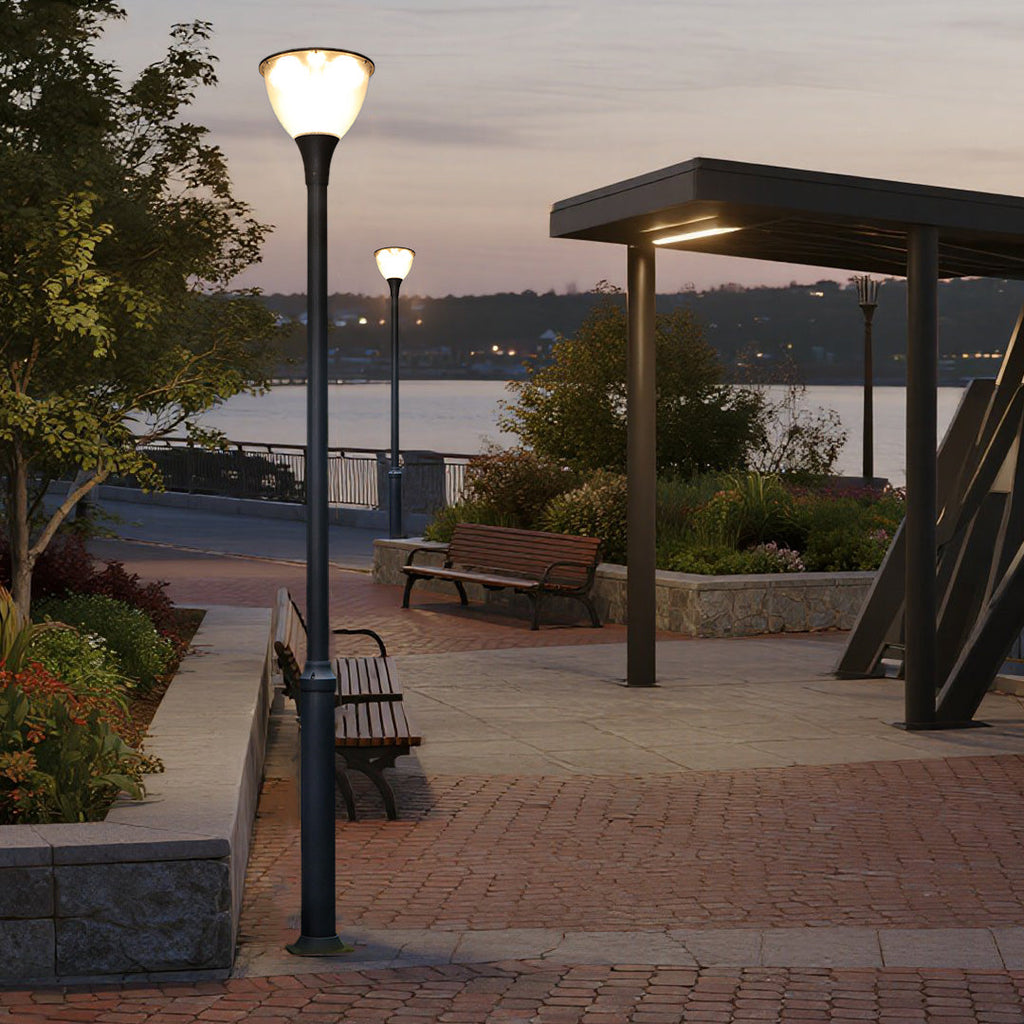 **LARCHMONT ILLUMINATED POST LANTERN**  
Sleek and contemporary, this outdoor post lantern features a streamlined silhouette, perfect for illuminating pathways and gardens with a modern touch.

**WINDSOR GLOW OUTDOOR LIGHTING COLUMN**  
A refined lighting