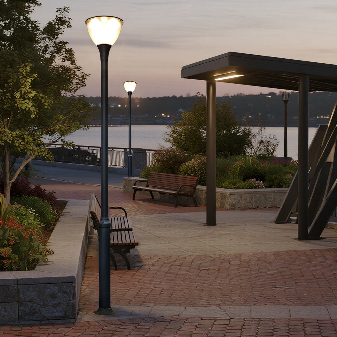 **LARCHMONT ILLUMINATED POST LANTERN**  
Sleek and contemporary, this outdoor post lantern features a streamlined silhouette, perfect for illuminating pathways and gardens with a modern touch.

**WINDSOR GLOW OUTDOOR LIGHTING COLUMN**  
A refined lighting