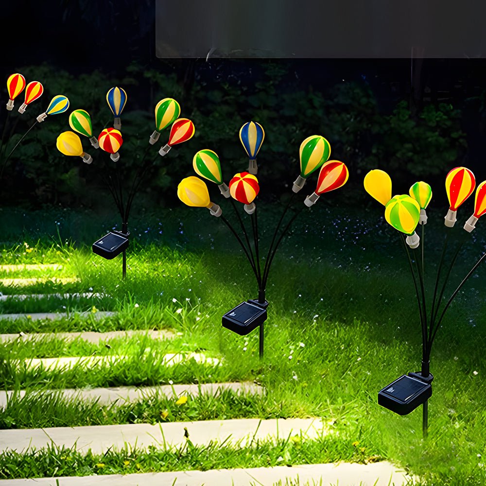 1. **HENLEY GLOWING SKYWARD ORBS - Solar-Powered Hot Air Balloon Luminaries (Set of 2)**  
   Illuminate your garden with whimsical floating orbs that harness solar energy, creating a magical ambiance.

2. **WILLOUGHBY AURORA AIRSHIP LIGHTS - Solar LED Ba