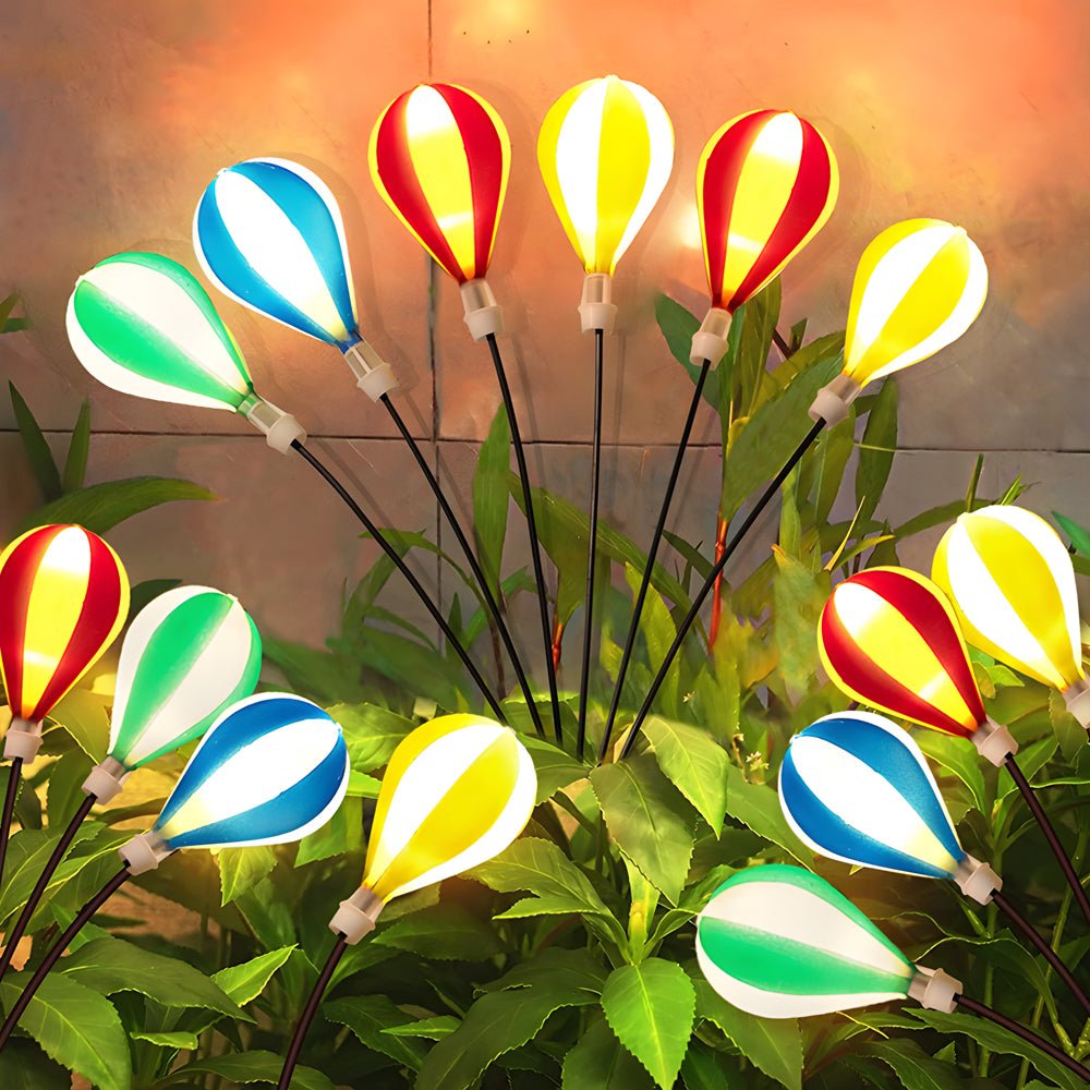 1. **HENLEY GLOWING SKYWARD ORBS - Solar-Powered Hot Air Balloon Luminaries (Set of 2)**  
   Illuminate your garden with whimsical floating orbs that harness solar energy, creating a magical ambiance.

2. **WILLOUGHBY AURORA AIRSHIP LIGHTS - Solar LED Ba