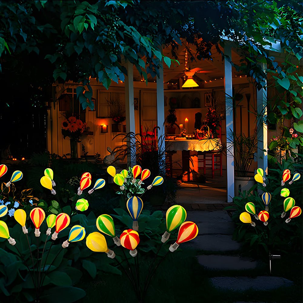 1. **HENLEY GLOWING SKYWARD ORBS - Solar-Powered Hot Air Balloon Luminaries (Set of 2)**  
   Illuminate your garden with whimsical floating orbs that harness solar energy, creating a magical ambiance.

2. **WILLOUGHBY AURORA AIRSHIP LIGHTS - Solar LED Ba