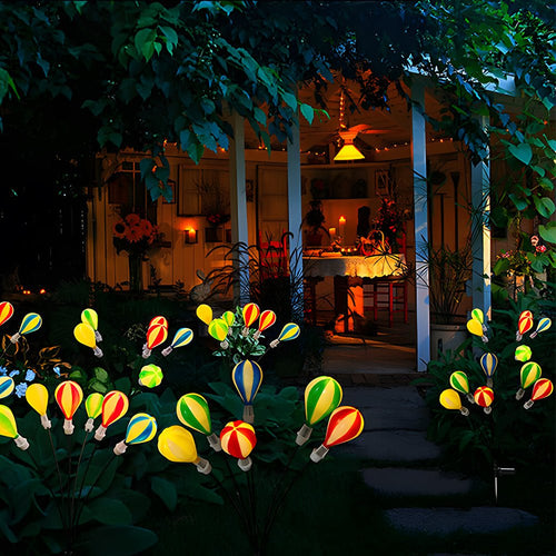1. **HENLEY GLOWING SKYWARD ORBS - Solar-Powered Hot Air Balloon Luminaries (Set of 2)**  
   Illuminate your garden with whimsical floating orbs that harness solar energy, creating a magical ambiance.

2. **WILLOUGHBY AURORA AIRSHIP LIGHTS - Solar LED Ba