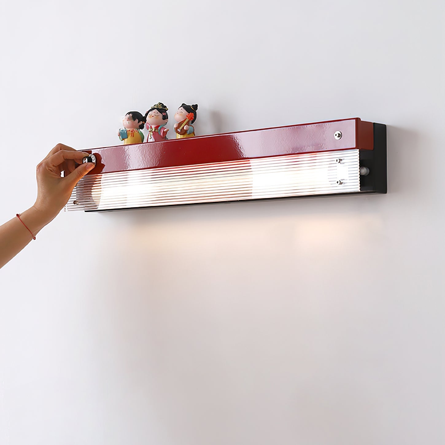 RAVENHALL WOODEN CARVED WALL ILLUMINATOR