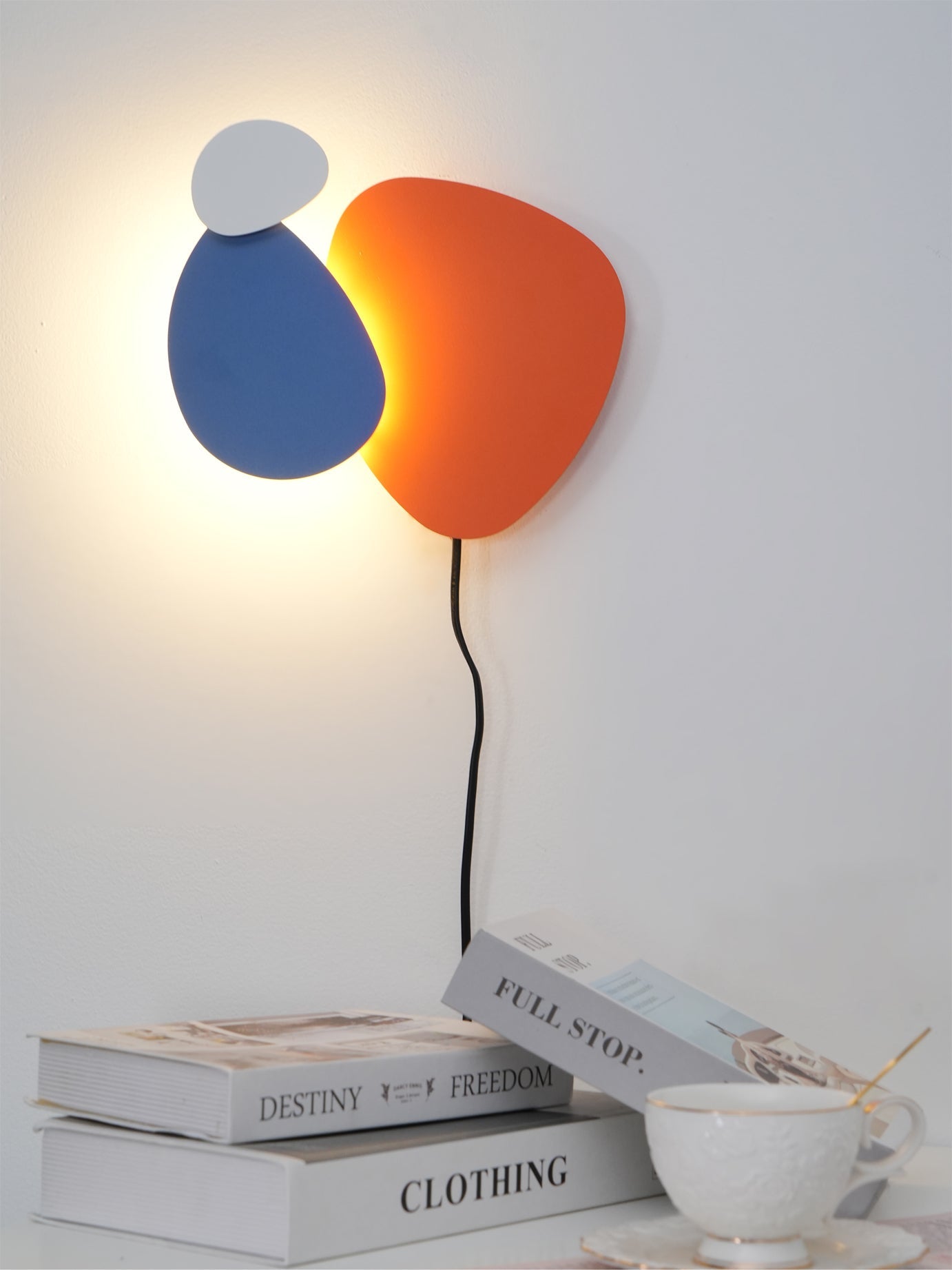 RAVENHALL ILLUMINATED WALL SCONCE