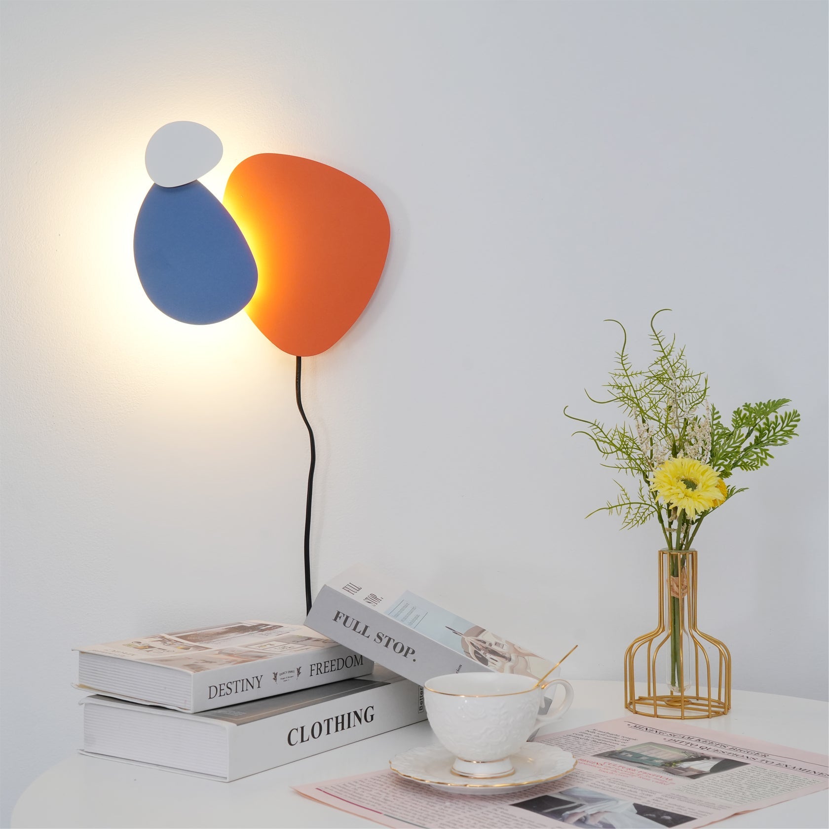 RAVENHALL ILLUMINATED WALL SCONCE