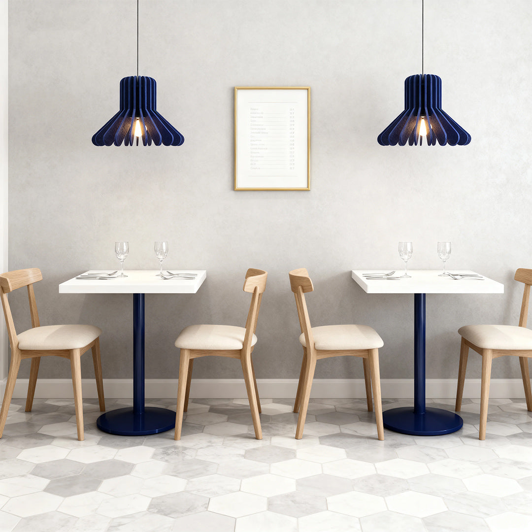 1. **MONTGOMERY FELT-ENCLOSED PENDANT LUMINAIRE**  
   A sophisticated pendant light featuring a sound-absorbing felt exterior and a robust iron frame, perfect for enhancing ambiance in any room.

2. **WINSLOW IRON & FELT HANGING ILLUMINATOR**  
   An inn