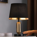WINTERBOURNE MID-CENTURY BRASS AND MONOCHROME TABLE LAMP
